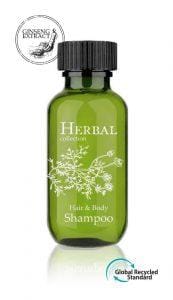Hotelkosmetik Shampoo in grüner Glasoptik-Flasche mit Kräuterdesign